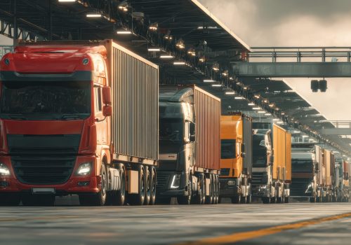 long-line-semi-trucks-industrial-loading-dock